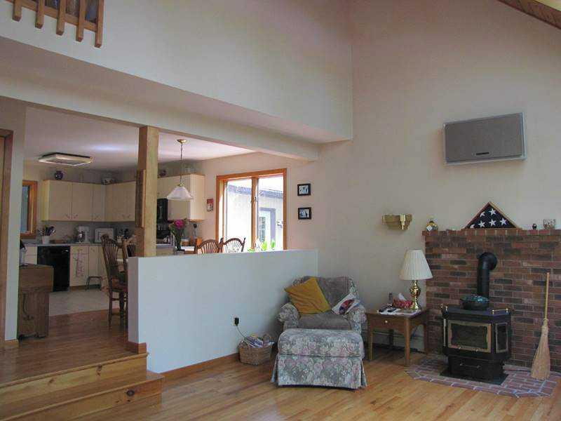 7 Stillwater Road Casco, ME 04015 - Photo 10 of 27 Living Room. Hearth and gas stove