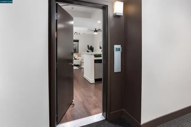 a view of a bathroom from a hallway
