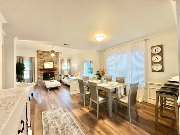a view of a dining room with furniture