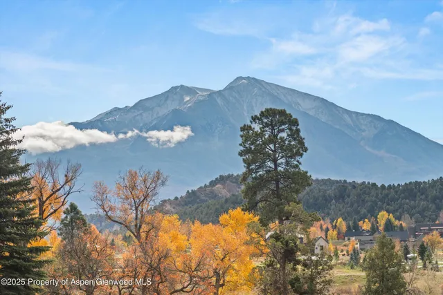 a view of a hallway with elevator