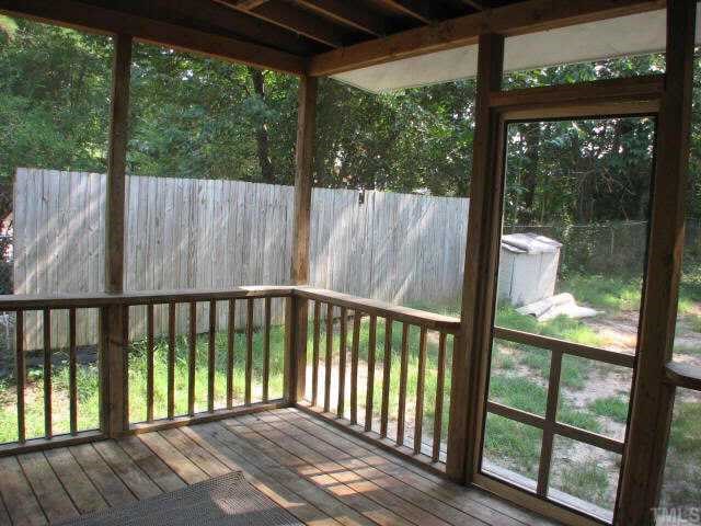 810 Faircloth Street Raleigh, NC 27607 - Photo 8 of 10 a view of a wooden balcony