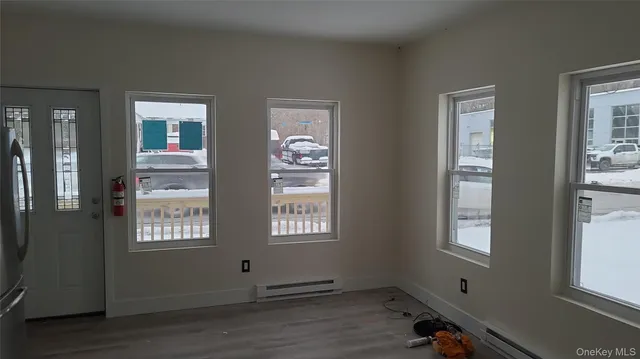 an empty room with windows