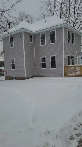 a front view of a house with windows