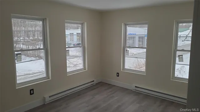 an empty room with windows