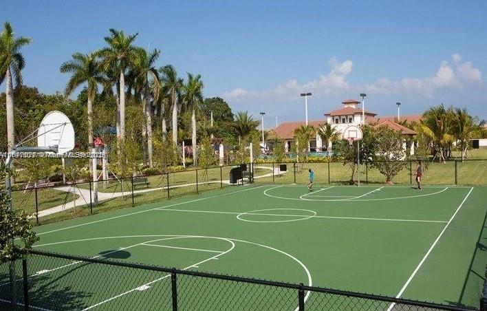 11343 Southwest 239 Street, Unit 11343 Homestead, FL 33032 - Photo 12 of 12 a tennis court view