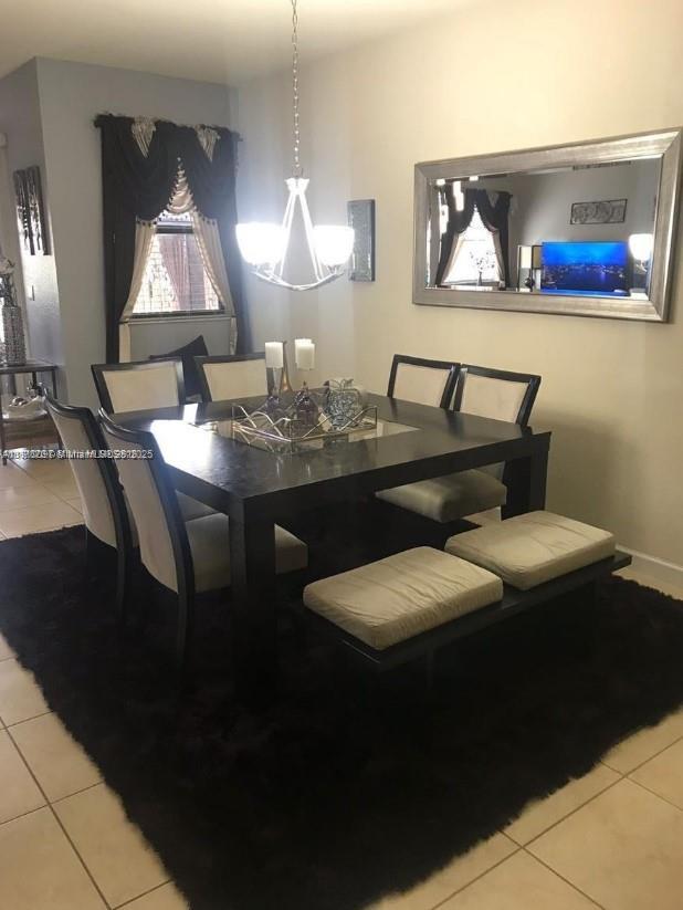 11343 Southwest 239 Street, Unit 11343 Homestead, FL 33032 - Photo 7 of 12 a bathroom with a sink and a mirror