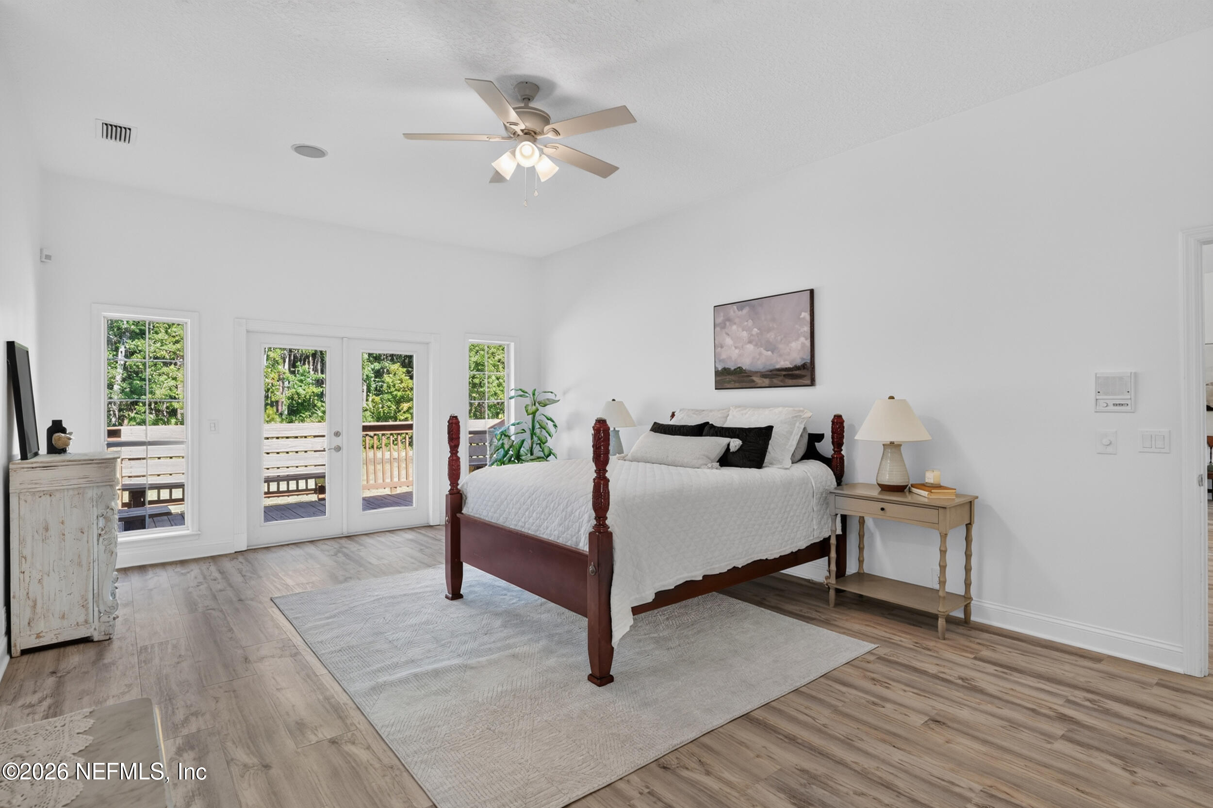 3090 Monument Bay Road St. Augustine, FL 32092 - Photo 21 of 56 a living room with furniture and a wooden floor
