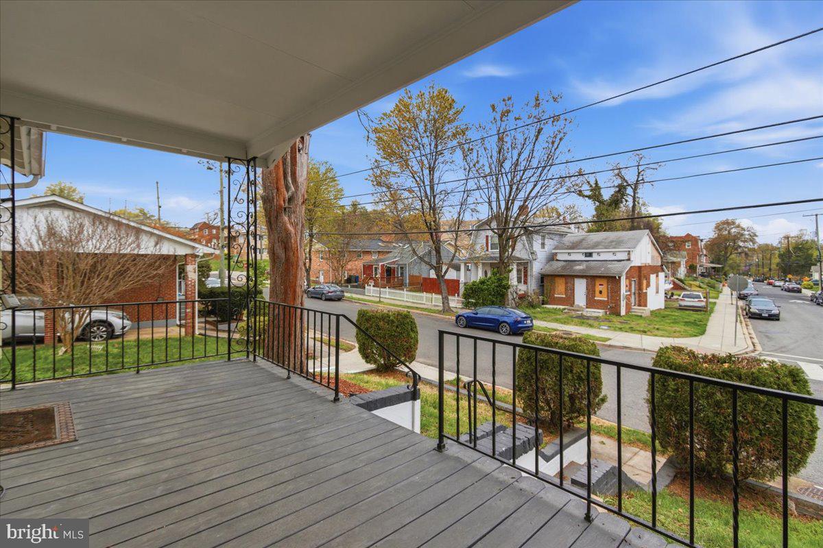 4705 Eads Street Northeast Washington, DC 20019 - Photo 2 of 16 a view of a building with a deck
