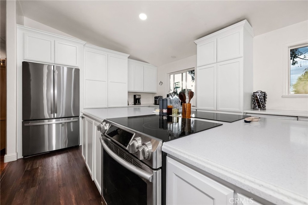 2728 Pentz Road Oroville, CA 95965 - Photo 8 of 52 a kitchen with stainless steel appliances a refrigerator a sink a stove and cabinets