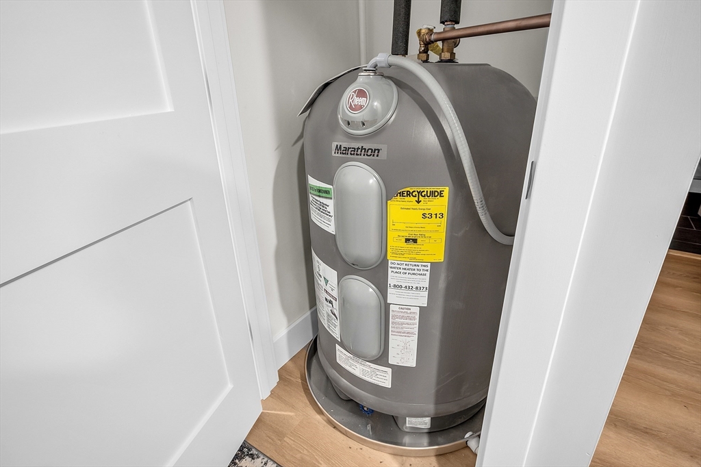 50 Main Street, Unit 101 Pepperell, MA 01463 - Photo 18 of 20 a view of storage and utility room