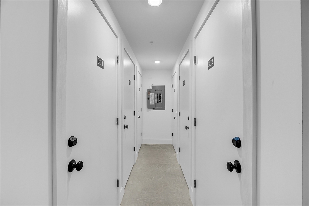 50 Main Street, Unit 101 Pepperell, MA 01463 - Photo 19 of 20 a view of a hallway