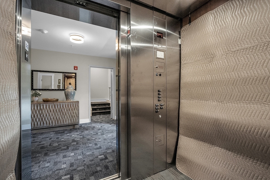 50 Main Street, Unit 101 Pepperell, MA 01463 - Photo 3 of 20 a bathroom with a tub and shower