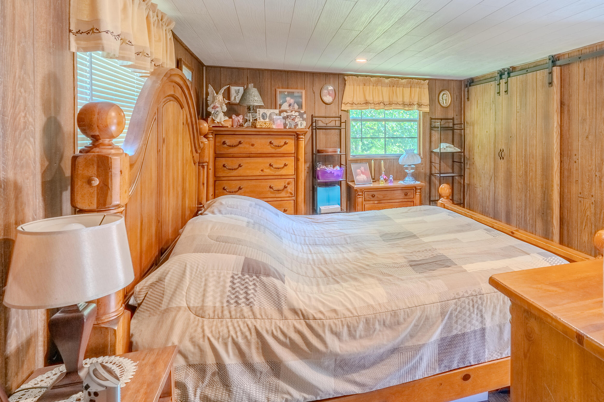 2100 Nemmo Road Vinton, VA 24179 - Photo 11 of 38 a bed room with a bed and a chair