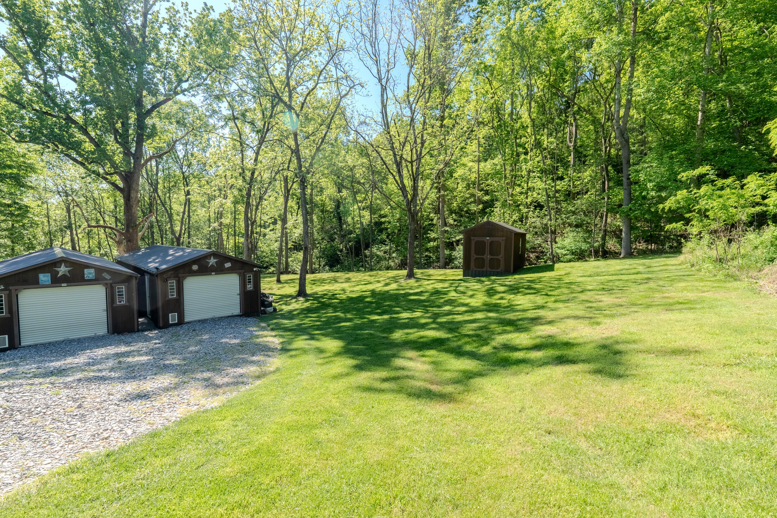 2100 Nemmo Road Vinton, VA 24179 - Photo 22 of 38 a view of a backyard with large trees