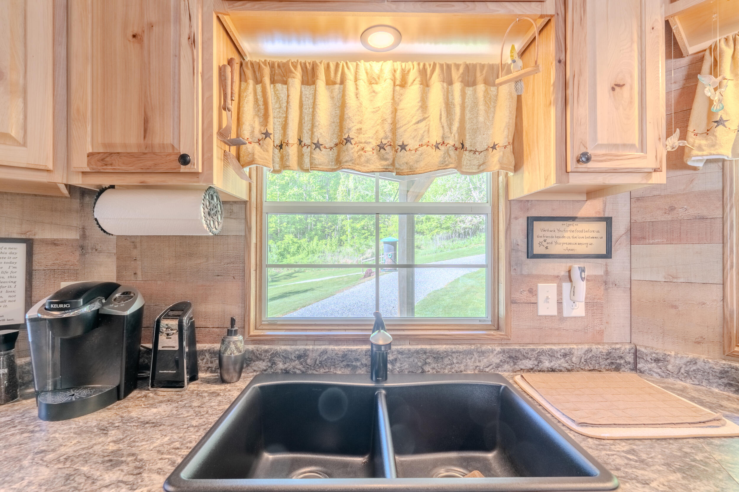 2100 Nemmo Road Vinton, VA 24179 - Photo 5 of 38 a kitchen with a sink a counter and a large window