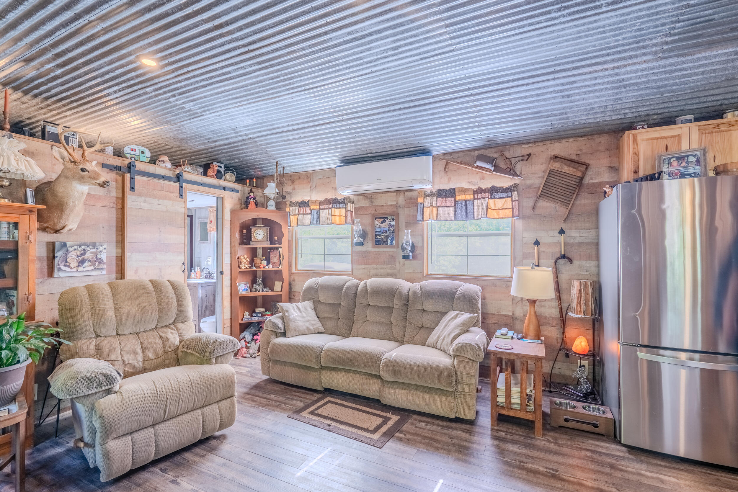 2100 Nemmo Road Vinton, VA 24179 - Photo 9 of 38 a living room with furniture and a wooden floor