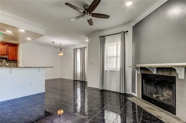 a view of an empty room and fire place