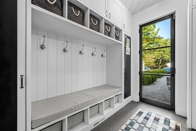 a view of a hallway with windows