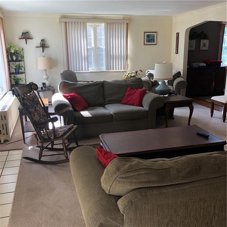 300 Radisson Road Pittsburgh, PA 15227 - Photo 2 of 31 a living room with furniture and wooden floor