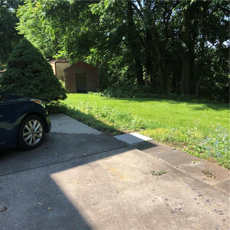 300 Radisson Road Pittsburgh, PA 15227 - Photo 27 of 31 a view of a backyard with large trees