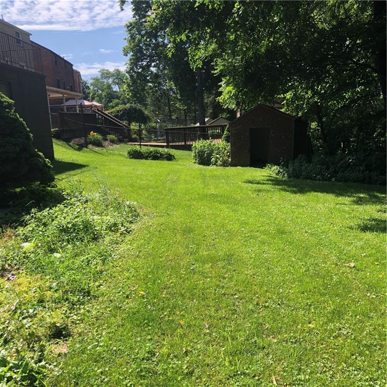 300 Radisson Road Pittsburgh, PA 15227 - Photo 29 of 31 a view of a backyard with large trees