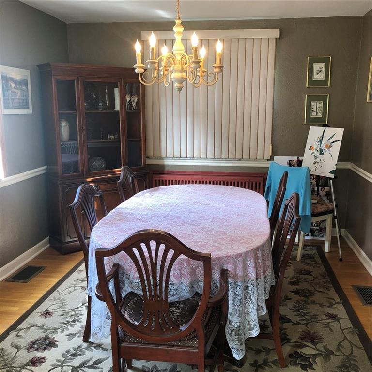 300 Radisson Road Pittsburgh, PA 15227 - Photo 4 of 31 a view of a dining room with furniture window and wooden floor