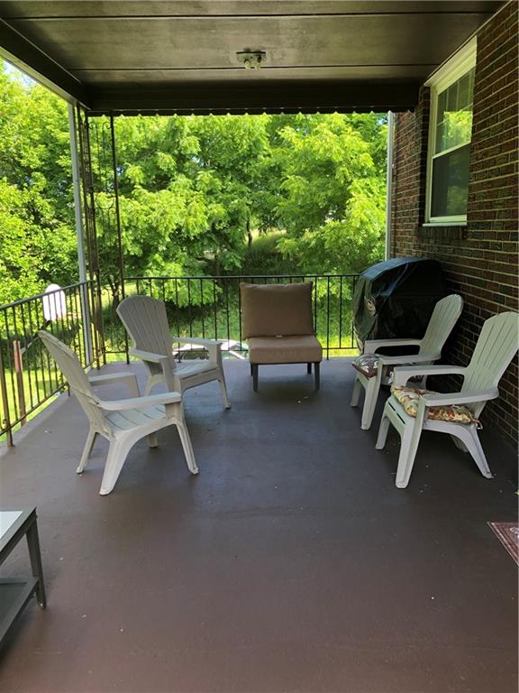 300 Radisson Road Pittsburgh, PA 15227 - Photo 8 of 31 a view of a porch with furniture and a yard
