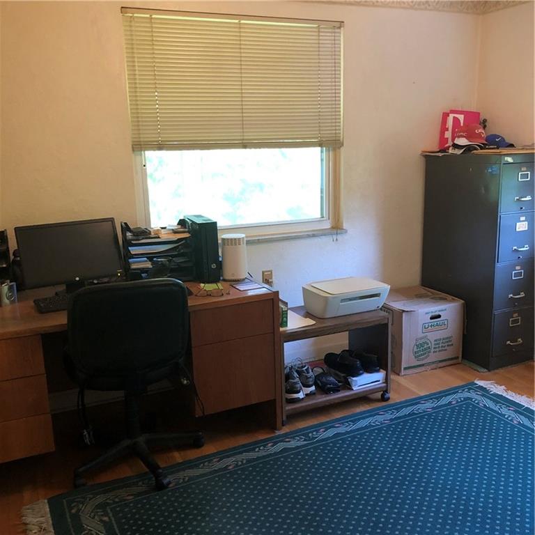 300 Radisson Road Pittsburgh, PA 15227 - Photo 10 of 31 a room with furniture a air conditioner vent and a window