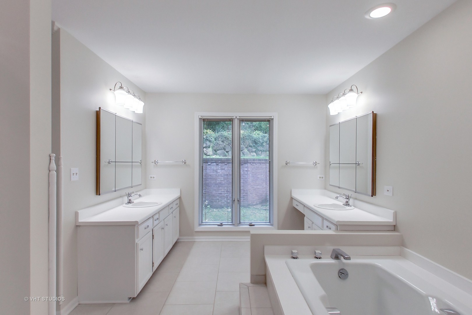 19 Marryat Road Trout Valley, IL 60013 - Photo 12 of 42 a bathroom with a tub sink and mirror