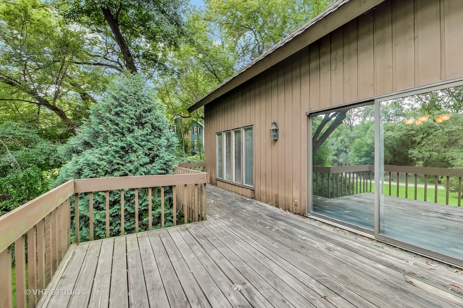 19 Marryat Road Trout Valley, IL 60013 - Photo 16 of 42 a balcony with wooden floor and yard in the back
