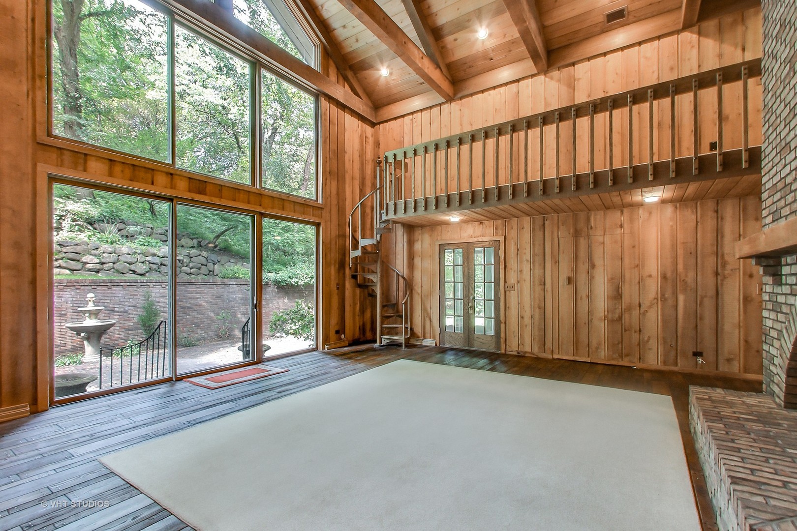 19 Marryat Road Trout Valley, IL 60013 - Photo 9 of 42 a view of an empty room with wooden floor and windows