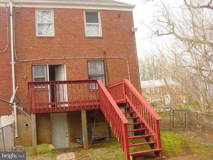 4035 Hilton Road Baltimore, MD 21215 - Photo 18 of 19 Freshly Painted Porch and Stairway