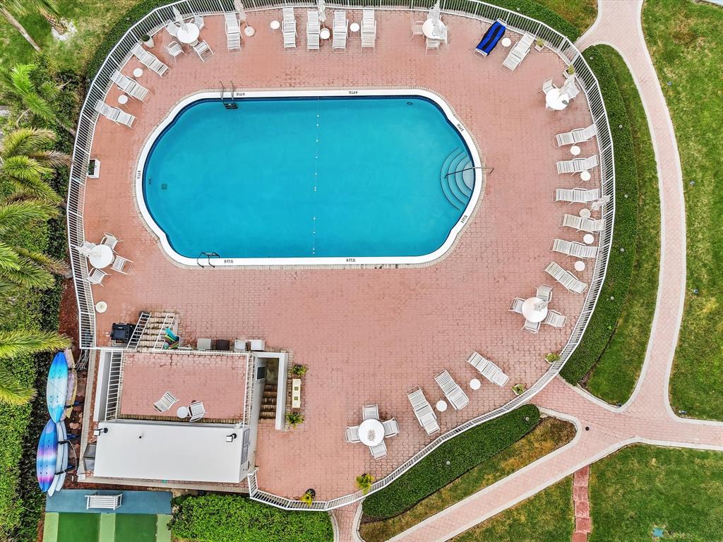 3100 South Ocean Boulevard, Unit 712 Highland Beach, FL 33487 - Photo 2 of 50 an aerial view of a house with a swimming pool and outdoor space
