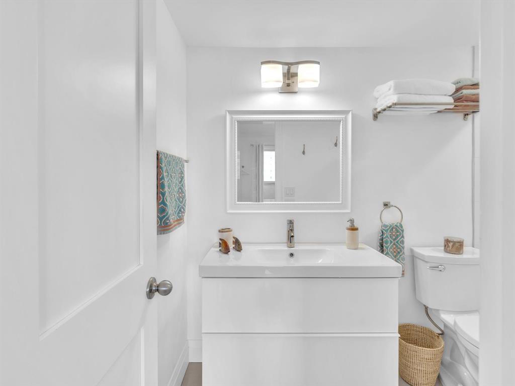 3100 South Ocean Boulevard, Unit 712 Highland Beach, FL 33487 - Photo 28 of 50 a bathroom with a sink and a mirror
