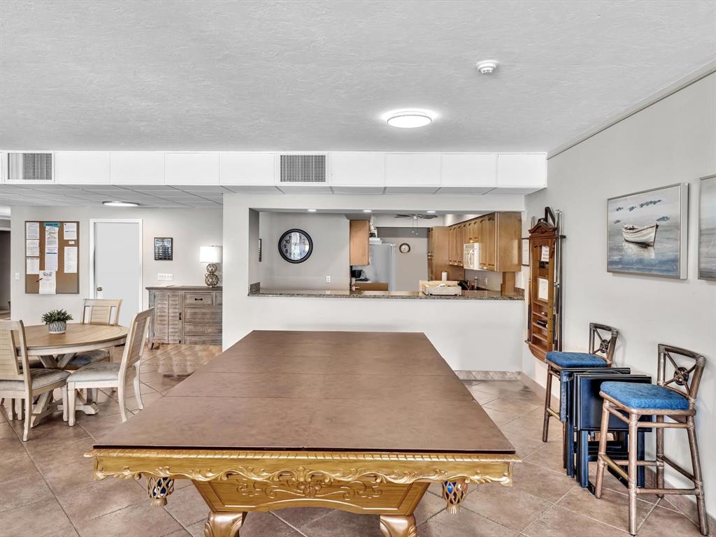 3100 South Ocean Boulevard, Unit 712 Highland Beach, FL 33487 - Photo 34 of 50 a view of a living room and kitchen