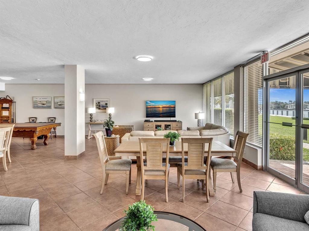3100 South Ocean Boulevard, Unit 712 Highland Beach, FL 33487 - Photo 35 of 50 a view of a dining room with furniture window and outside view