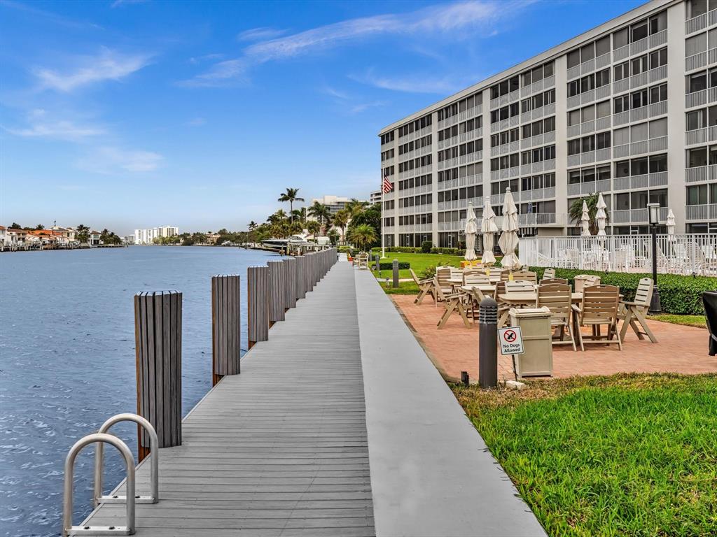 3100 South Ocean Boulevard, Unit 712 Highland Beach, FL 33487 - Photo 40 of 50 a view of a balcony with outdoor seating and city view