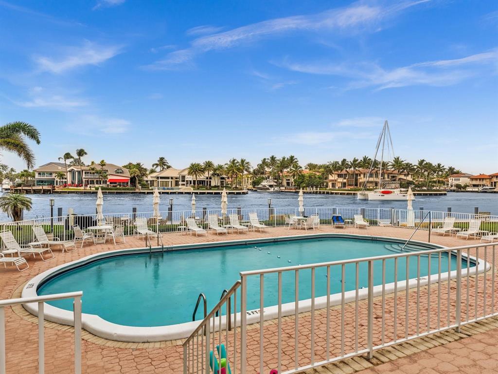 3100 South Ocean Boulevard, Unit 712 Highland Beach, FL 33487 - Photo 42 of 50 a view of a chairs and table on the terrace