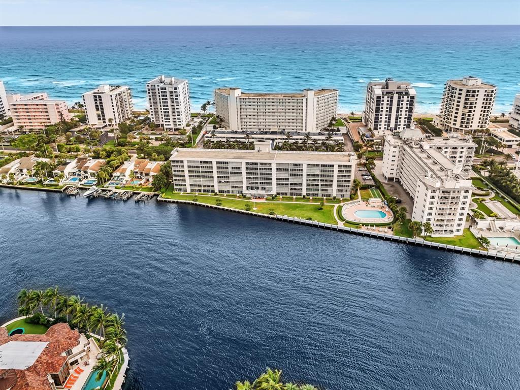 3100 South Ocean Boulevard, Unit 712 Highland Beach, FL 33487 - Photo 46 of 50 a view of a lake with tall buildings