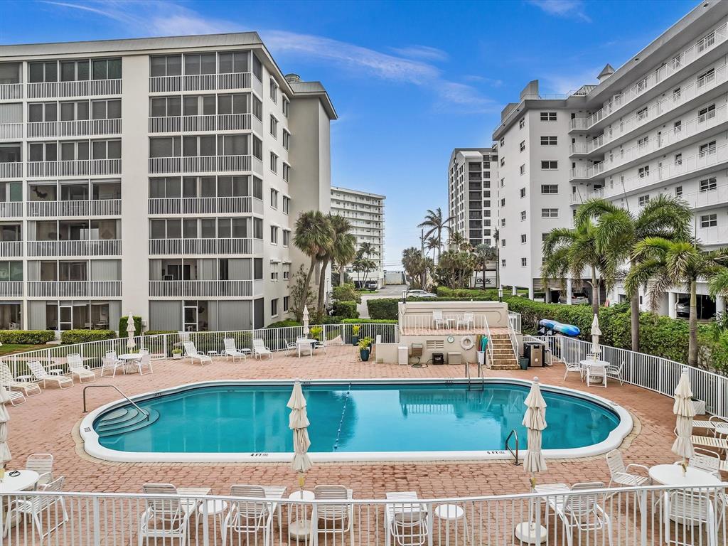3100 South Ocean Boulevard, Unit 712 Highland Beach, FL 33487 - Photo 49 of 50 a view of a swimming pool with a patio
