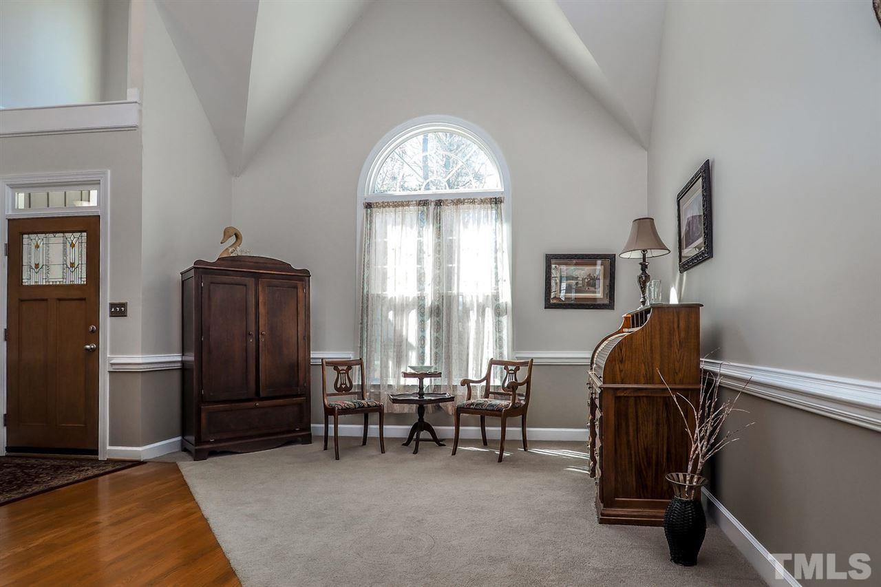 2028 Muirfield Village Way Raleigh, NC 27604 - Photo 3 of 20 Vaulted ceiling. Check out that gorgeous front door!