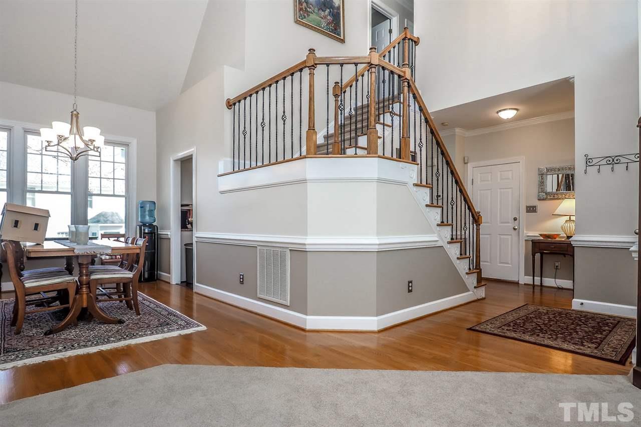 2028 Muirfield Village Way Raleigh, NC 27604 - Photo 5 of 20 Formal living room opens to formal dining.