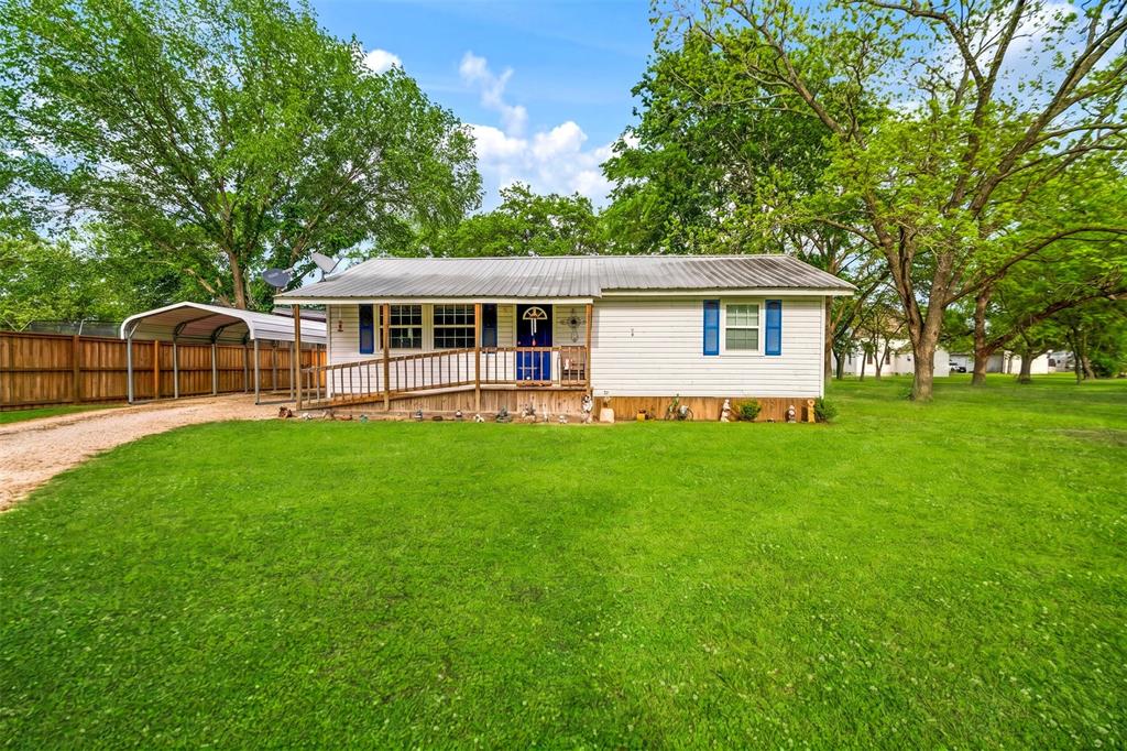 170 2nd SW Street Detroit, TX 75436 - Photo 1 of 1 a view of a house with a backyard