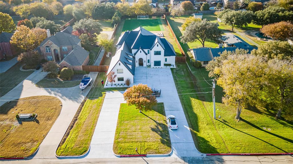 10545 Rogers Road Frisco, TX 75033 - Photo 3 of 40 an aerial view of a swimming pool