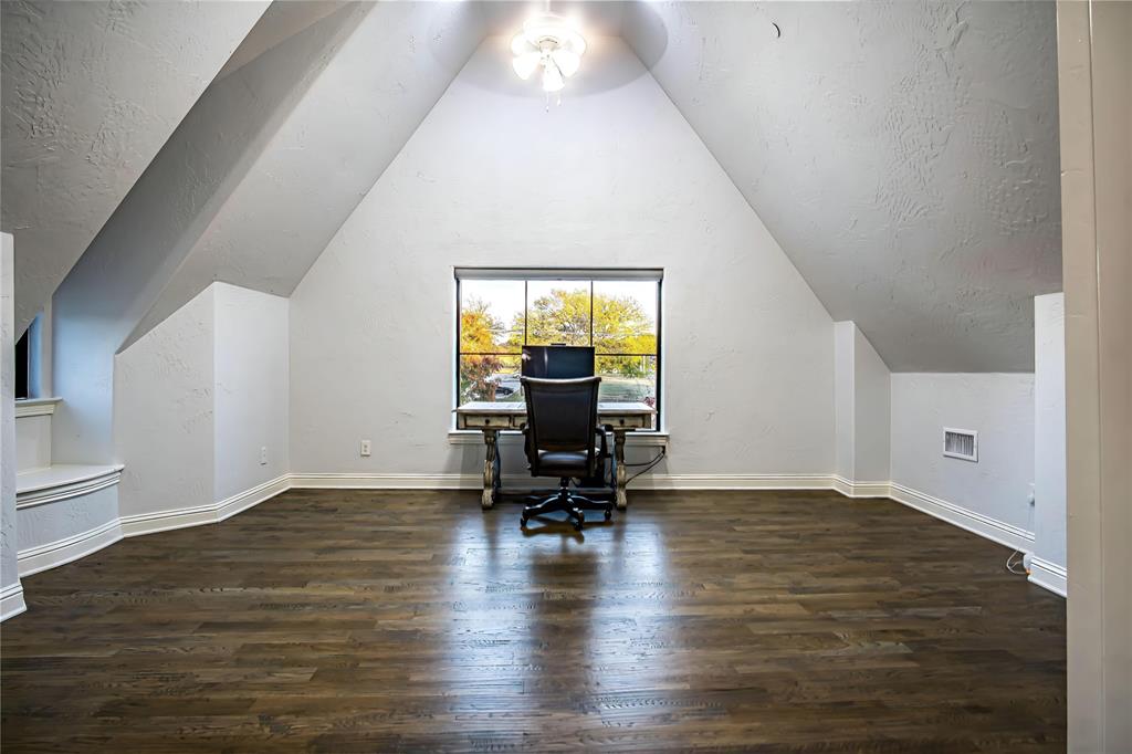 10545 Rogers Road Frisco, TX 75033 - Photo 33 of 40 a view of a workspace with wooden floor