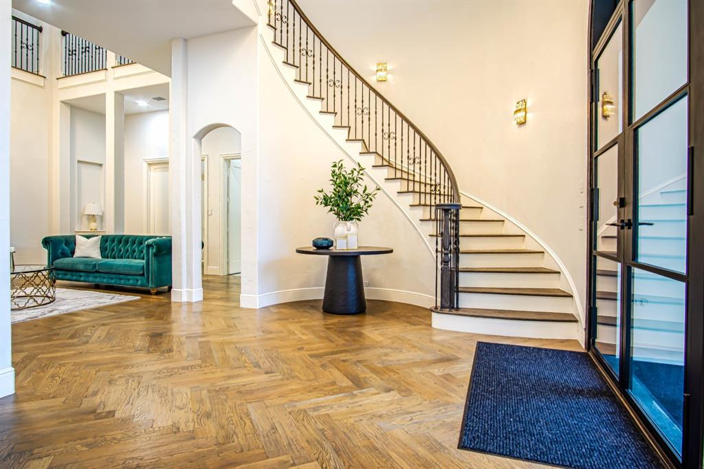 10545 Rogers Road Frisco, TX 75033 - Photo 4 of 40 a view of entryway and hall with wooden floor