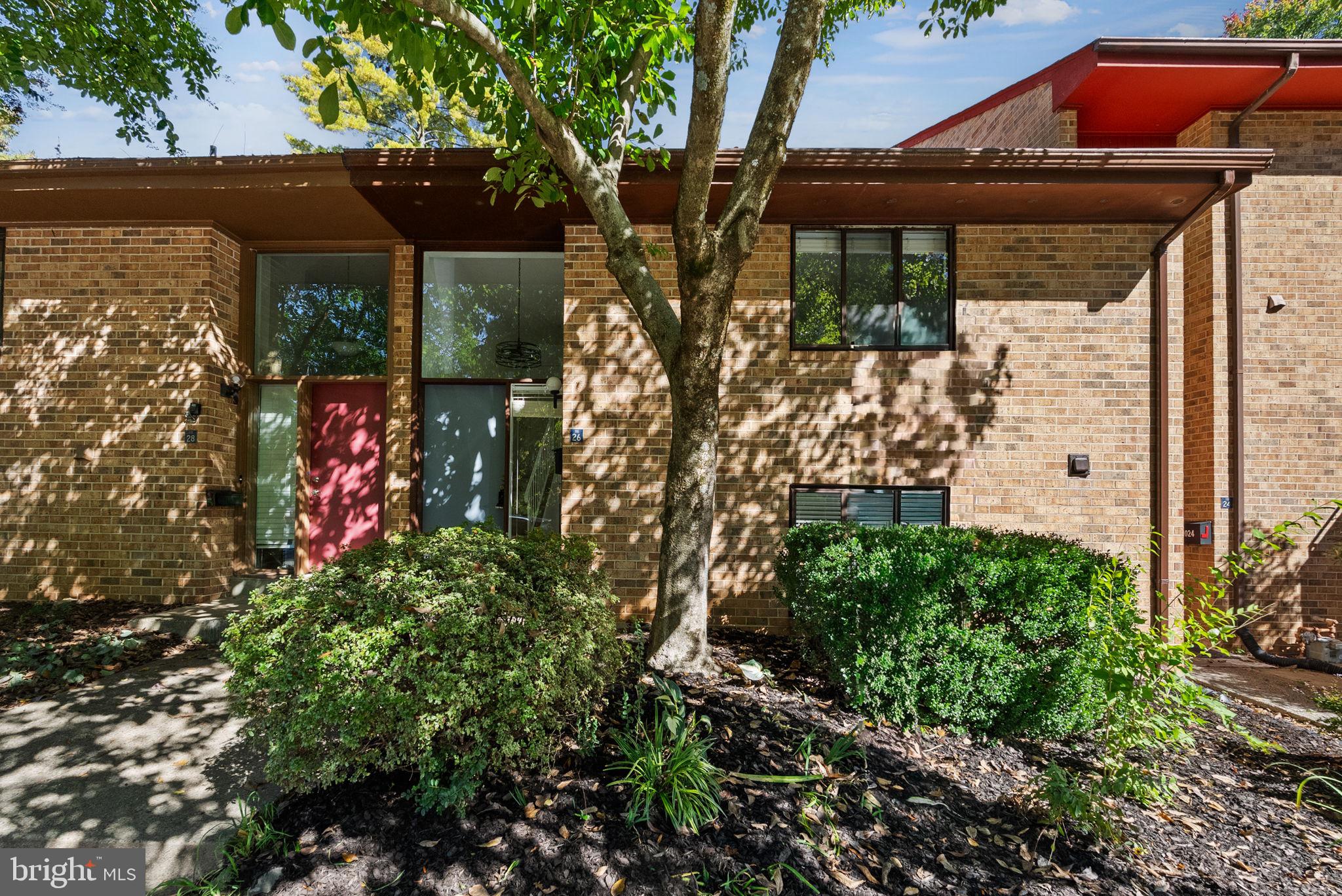 11026 Saffold Way Reston, VA 20190 - Photo 20 of 30 an outdoor space with lots of green space and trees