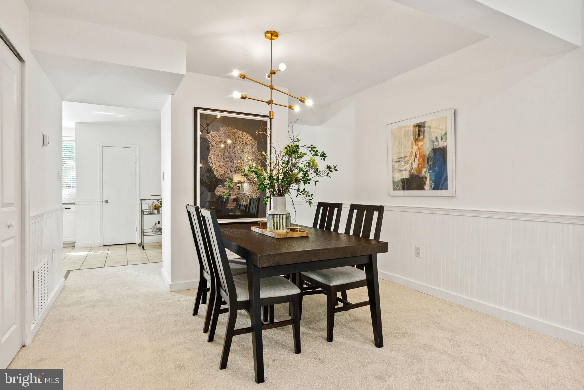 11026 Saffold Way Reston, VA 20190 - Photo 23 of 30 a dining room with furniture and window