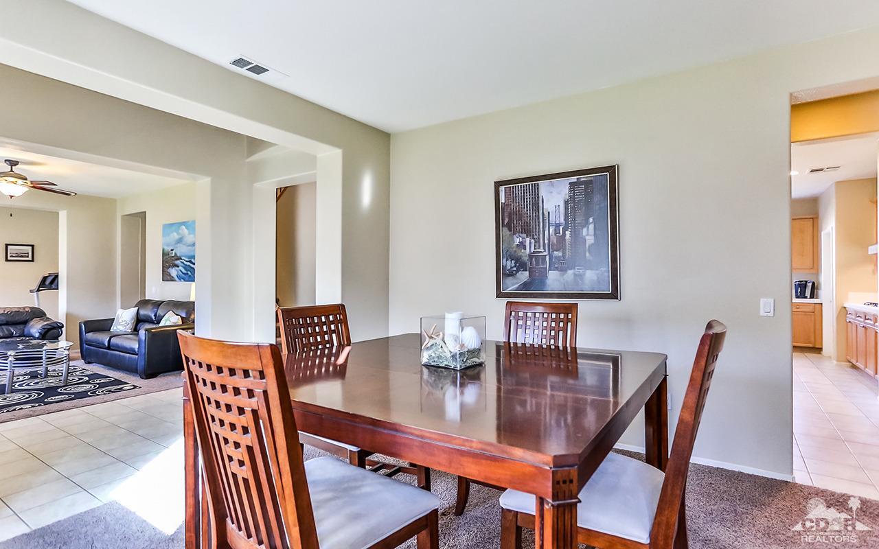 83330 Lightning Road Indio, CA 92203 - Photo 16 of 39 a view of a dining room with furniture