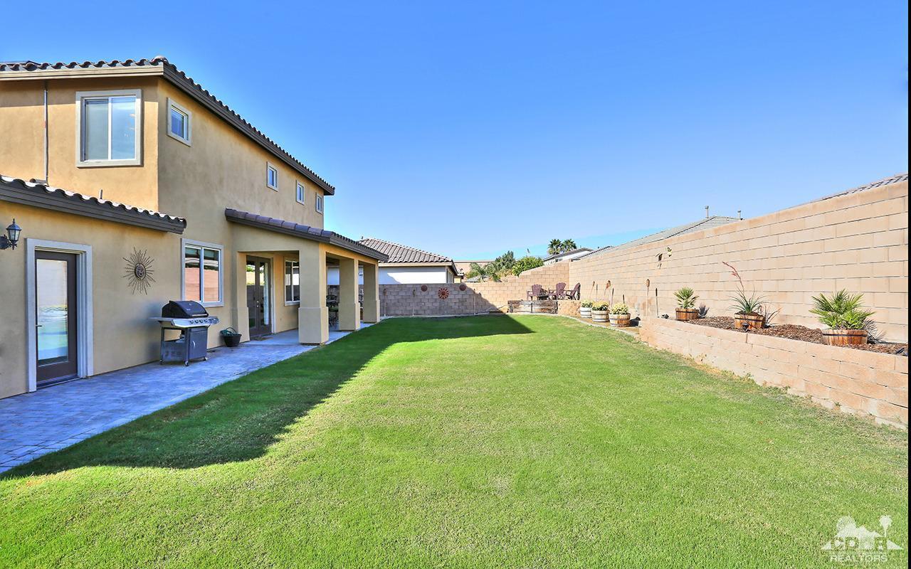83330 Lightning Road Indio, CA 92203 - Photo 38 of 39 a view of a house with backyard and sitting area
